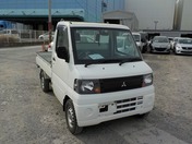 It is a picture of the white mitsubishi minicab truck in 2009,First Photo Stock No.Y021660
