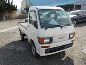 It is a picture of the white daihatsu hijet truck in 1998,First Photo Stock No.Y021801