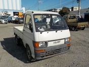It is a picture of the white daihatsu hijet  truck in 1994,First Photo Stock No.Y021802