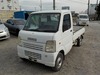 It is a picture of the white suzuki carry truck in 2003,Sub Photo 1 Stock No.Y021879
