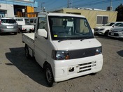It is a picture of the white mitsubishi minicab truck in 2004,First Photo Stock No.Y021914