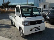 It is a picture of the white mitsubishi minicab truck in 2001,First Photo Stock No.Y022033