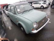 It is a picture of the olive nissan pao open top in 1989,First Photo Stock No.Y022101