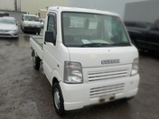 It is a picture of the white suzuki carry truck in 2005,First Photo Stock No.Y022207