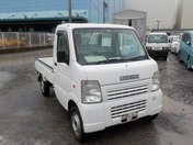 It is a picture of the white suzuki carry truck in 2009,First Photo Stock No.Y022387
