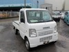 It is a picture of the white suzuki carry truck in 2009,Sub Photo 0 Stock No.Y022387