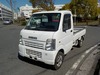 It is a picture of the white suzuki carry truck in 2005,Sub Photo 1 Stock No.Y022431