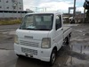 It is a picture of the white suzuki carry truck in 2003,Sub Photo 1 Stock No.Y022470