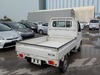 It is a picture of the white suzuki carry truck in 2003,Sub Photo 2 Stock No.Y022470
