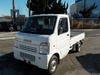 It is a picture of the white suzuki carry truck in 2006,Sub Photo 1 Stock No.Y022478
