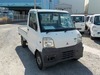 It is a picture of the white mitsubishi minicab  truck in 1999,Sub Photo 0 Stock No.Y022532