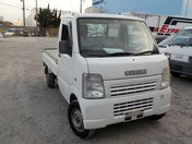 It is a picture of the white suzuki carry  truck in 2003,First Photo Stock No.Y022580