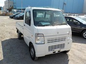 It is a picture of the white suzuki carry  truck in 2010,First Photo Stock No.Y022581