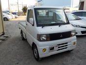 It is a picture of the white mitsubishi minicab  truck in 2003,First Photo Stock No.Y022599