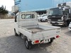 It is a picture of the white suzuki carry truck in 2004,Sub Photo 3 Stock No.Y022721