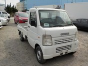 It is a picture of the white suzuki carry truck in 2009,First Photo Stock No.Y022775