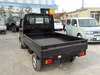 It is a picture of the black suzuki carry truck in 2004,Sub Photo 3 Stock No.Y022810