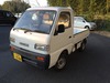 It is a picture of the white suzuki carry truck in 1993,Sub Photo 1 Stock No.Y022966