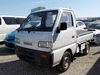 It is a picture of the white suzuki carry truck in 1993,Sub Photo 1 Stock No.Y023123