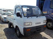 It is a picture of the white suzuki carry truck in 1993,First Photo Stock No.Y023123