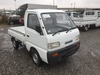 It is a picture of the white suzuki carry truck in 1994,Sub Photo 0 Stock No.Y023129