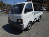 It is a picture of the white mitsubishi minicab truck in 1994,Sub Photo 1 Stock No.Y023325