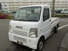 It is a picture of the white suzuki carry truck in 2006,Sub Photo 1 Stock No.Y023564