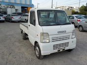 It is a picture of the white suzuki carry  truck in 2003,First Photo Stock No.Y023643