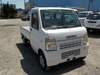 It is a picture of the white suzuki carry truck in 2005,Sub Photo 0 Stock No.Y023827