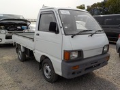 It is a picture of the white daihatsu hijet truck in 1991,First Photo Stock No.Y023915