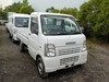 It is a picture of the white suzuki carry truck in 2003,Sub Photo 0 Stock No.Y024118