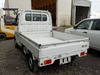 It is a picture of the white suzuki carry truck in 2003,Sub Photo 3 Stock No.Y024118