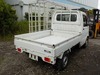 It is a picture of the white suzuki carry truck in 2003,Sub Photo 2 Stock No.Y024118