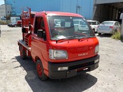 It is a picture of the red daihatsu hijet fire truck in 1999,First Photo Stock No.Y024206