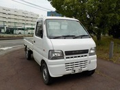 It is a picture of the white suzuki carry truck in 2001,First Photo Stock No.Y024220