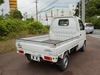 It is a picture of the white suzuki carry truck in 2001,Sub Photo 2 Stock No.Y024220