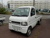 It is a picture of the white suzuki carry truck in 2001,Sub Photo 1 Stock No.Y024220