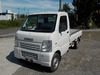 It is a picture of the white suzuki carry truck in 2002,Sub Photo 1 Stock No.Y025067