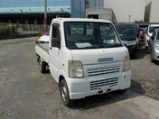 It is a picture of the white suzuki carry truck in 2003,First Photo Stock No.Y025501