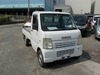 It is a picture of the white suzuki carry truck in 2003,Sub Photo 0 Stock No.Y025501