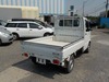 It is a picture of the white suzuki carry truck in 2003,Sub Photo 2 Stock No.Y025501