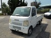 It is a picture of the white suzuki carry truck in 2003,Sub Photo 1 Stock No.Y025501