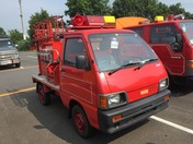 It is a picture of the red daihatsu hijet  fire truck in 1992,First Photo Stock No.Y025850