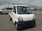 It is a picture of the white mitsubishi minicab truck in 1999,First Photo Stock No.Y025882