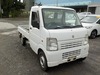 It is a picture of the white suzuki carry truck in 2009,Sub Photo 0 Stock No.Y026321