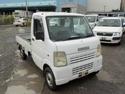It is a picture of the white suzuki carry  truck in 2003,First Photo Stock No.Y026323