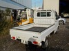 It is a picture of the white suzuki carry truck in 2003,Sub Photo 2 Stock No.Y026429