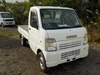 It is a picture of the white suzuki carry truck in 2003,Sub Photo 0 Stock No.Y026429