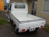 It is a picture of the white suzuki carry truck in 2003,Sub Photo 3 Stock No.Y026489