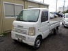 It is a picture of the white suzuki carry truck in 2003,Sub Photo 1 Stock No.Y026489